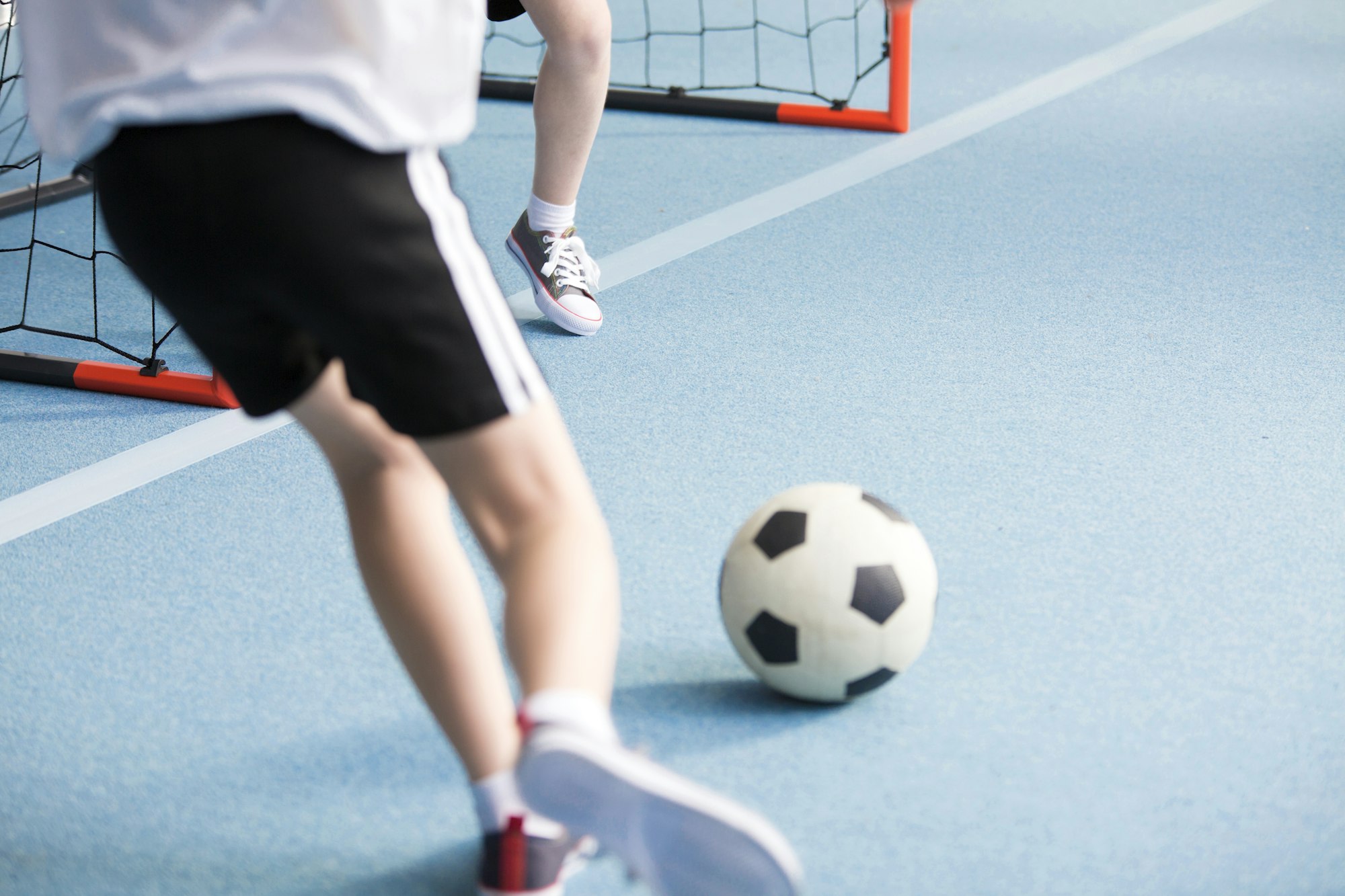 Boy playing soccer